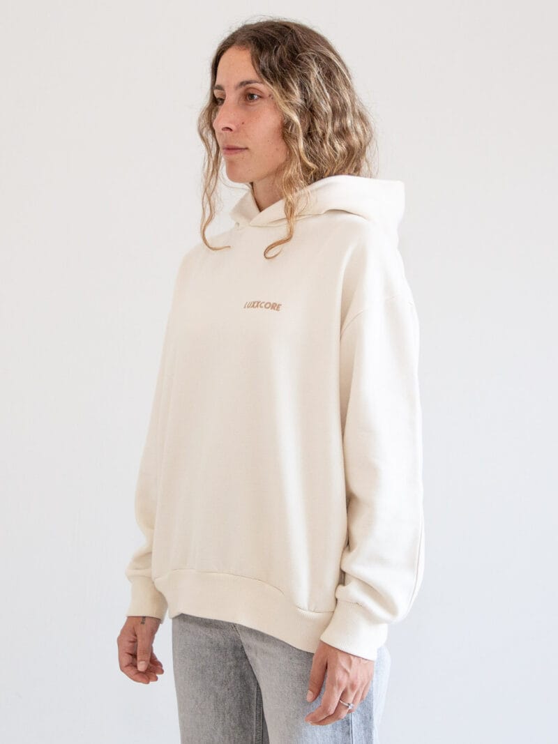 Sudadera unisex algodón 100% orgánico ecru, giro 4/4 izquierda, logo bordado